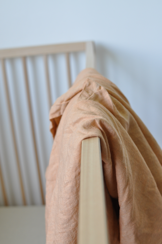 pale peach linen swaddle