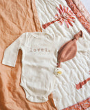 Loved organic long sleeve bodysuit by tenth & pine