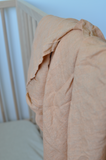 pale peach linen swaddle
